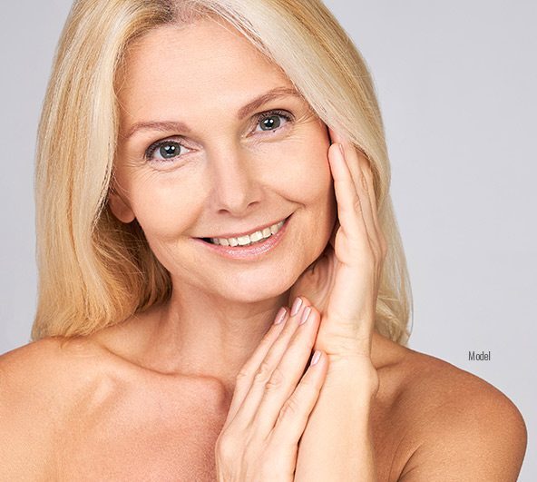 a beautiful older woman with glowing, smooth skin